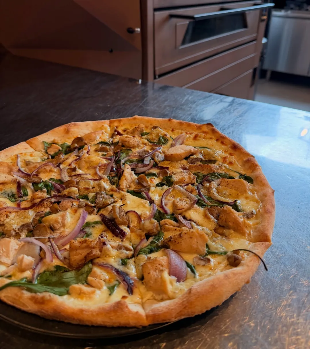 The Chicken Pot π on its white base.